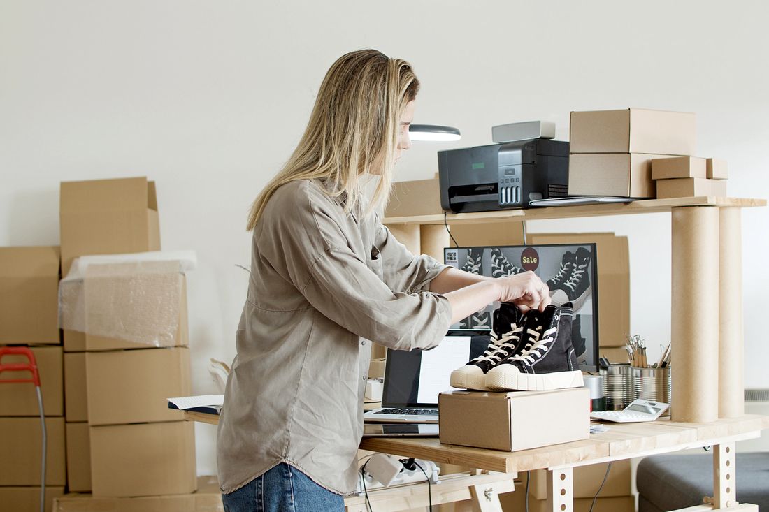 Shopify merchant packing an order
